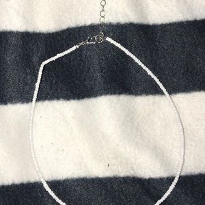 white bead necklace